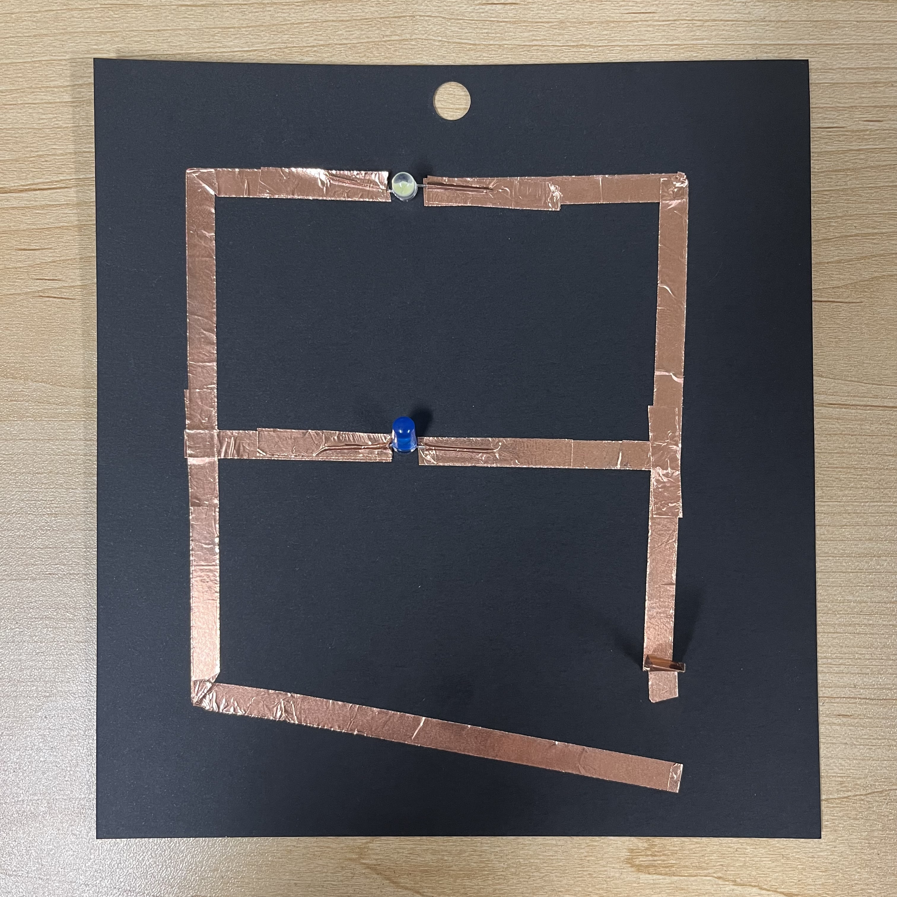 Here is the full circuit assembly. The left side is positive, the right side is negative. This also requires 2 batteries to function like the series circuit.