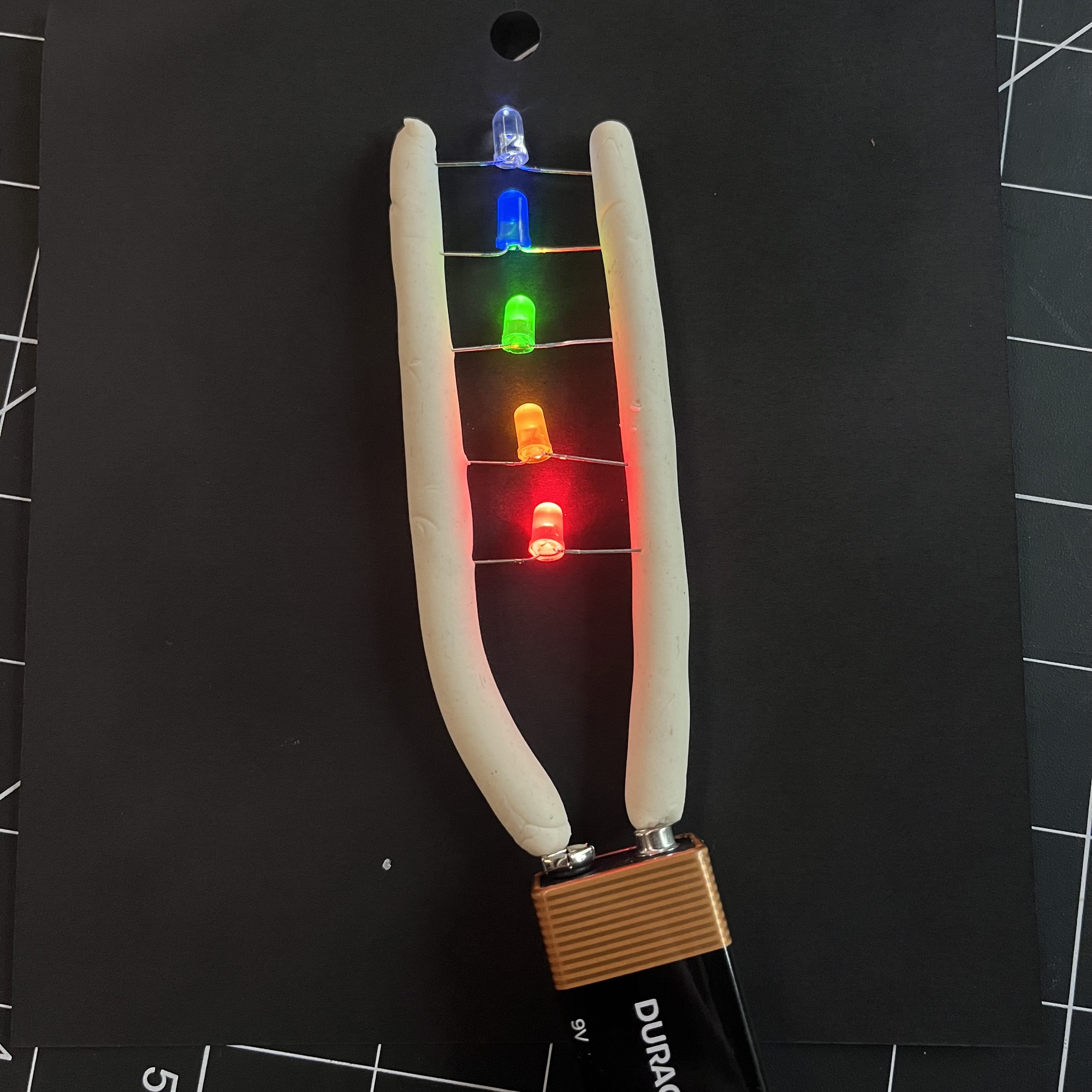 I wanted to see how far I could stack the LEDS with them remaining lit, so I used 1 of each colour and surprisingly they all lit up. The further down the chain you go the less power there is available, so they gradually get dimmer.