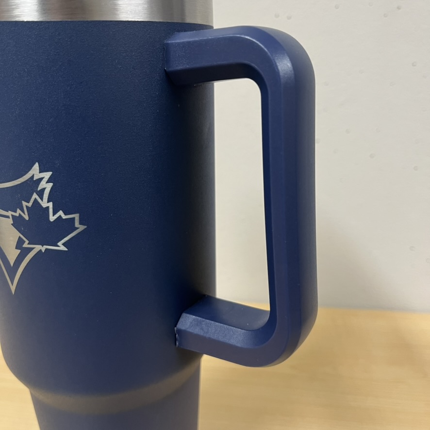 I want to focus on building this handle because it's an interesting shape. It projects out slightly more at the bottom than the top, and it has a bevel design around the edges in addition to the sharp curves that make up the main form of the handle. This image shows the bevel more, to see the difference in the projection look at the previous image.