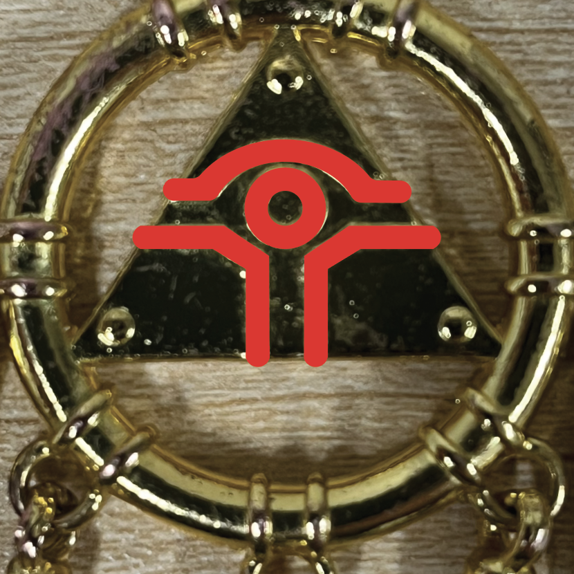 So you might be wondering what is happening here. I was not about to fight with the spline tool to get a nice linework style Egyptian Eye design, so instead I took a photo from directly above of the pendant, and drew over it using Illustrator's curved pen tool. Then I imported it into C4D but because it was an outline, there wasn't an easy way to fill the void. I went back to Illustrator, and changed the objects from outlines to a solid mass and this is what the final shape was before I imported it into C4D. It worked very well and saved me a lot of time.