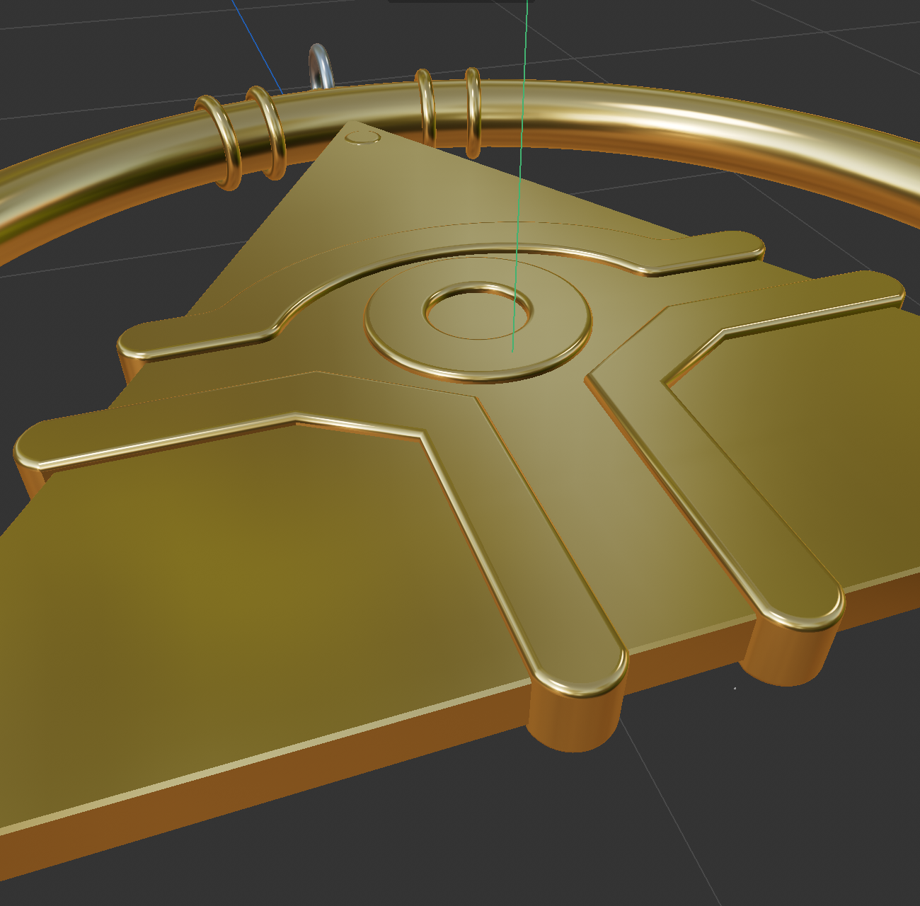 Here is the eye design extruded and then moved into position in the pendant. I am supremely happy with how this looks. I achieved the smoothed edges by changing the cap shape to 'round' so it had a highlighted and more reflective effect. It was too flat and not as visually appealing before that.